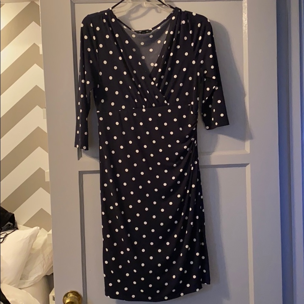 Navy and white polka dot faux wrap dress